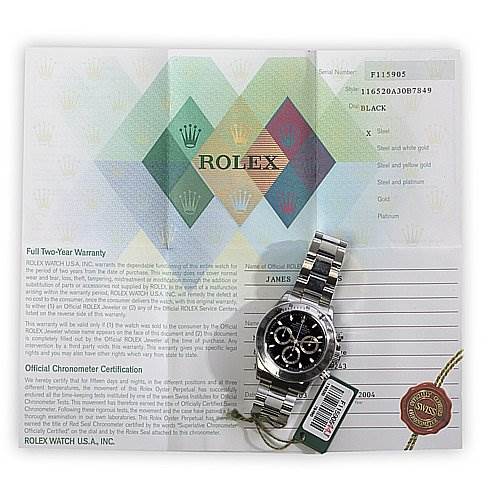 The image shows a Rolex Daytona 116520 Men's Stainless Steel Black Dial 116520 Men's Stainless Steel Black Dial watch placed on top of its warranty and chronometer certification documents.