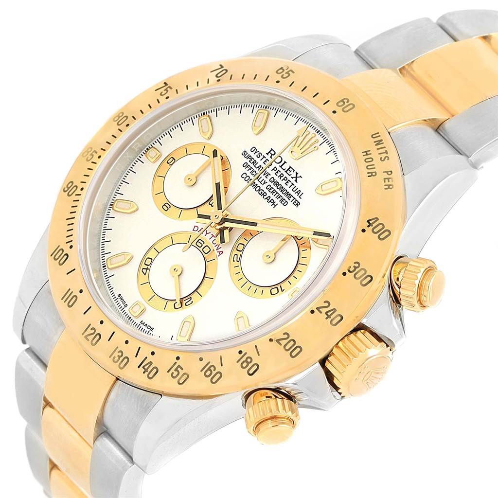 This Rolex Daytona 116523 Men's Steel and Gold (two tone) White Dial 116523 Men's Steel and Gold (two tone) White Dial watch is shown from a slightly angled, close-up perspective highlighting the face, bezel, and part of the bracelet.