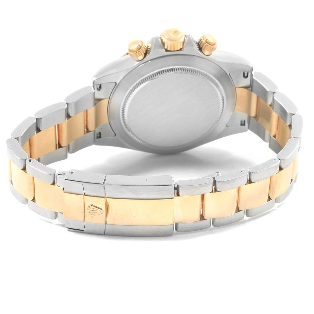 The image shows the back of a Rolex Daytona 116523 Men's Steel and Gold (two tone) Grey Dial 116523 Men's Steel and Gold (two tone) Grey Dial watch, highlighting its two-tone bracelet and clasp.