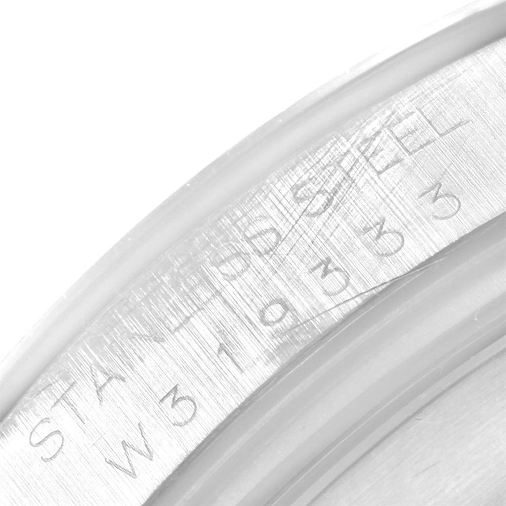 This is a close-up of the serial number engraving on the stainless steel case of a Rolex Daytona 16520 Men's Stainless Steel Black Dial 16520 Men's Stainless Steel Black Dial watch.