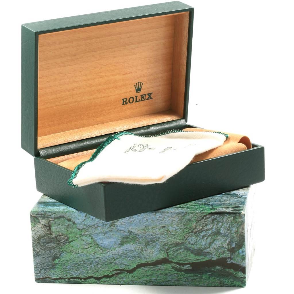 The image shows the Rolex watch box and accessories from an open angle, specifically for the Daytona model.