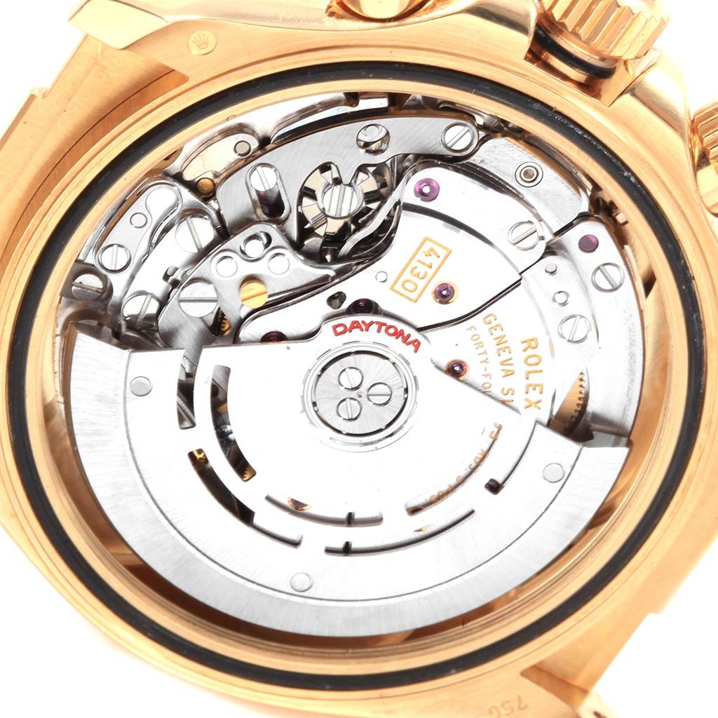 The image shows the movement and internal mechanism of a Rolex Daytona 116518 Men's Yellow Gold Blue Dial 116518 Men's Yellow Gold Blue Dial watch from a rear angle.