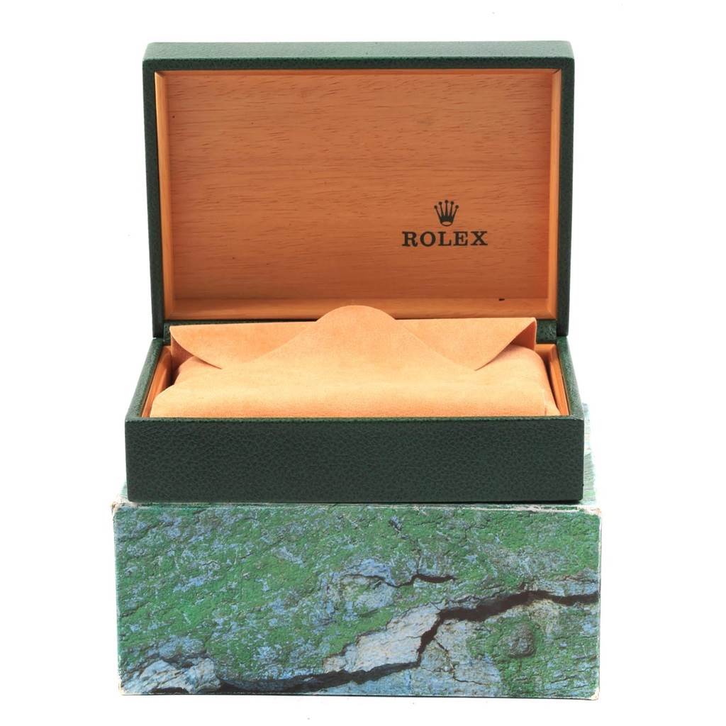 The image shows the open box for a Rolex Daytona 16520 Men's Stainless Steel White Dial 16520 Men's Stainless Steel White Dial model watch, featuring the brand's logo inside the lid.