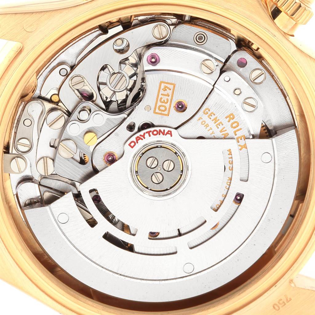 The image shows a close-up of the movement mechanism of a Rolex Daytona 116528 Men's Yellow Gold Black Dial 116528 Men's Yellow Gold Black Dial watch.