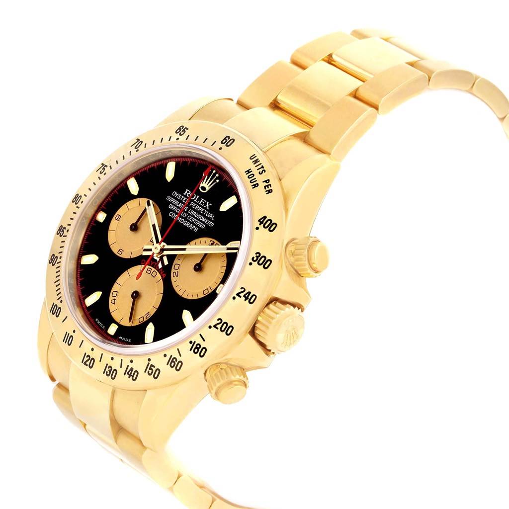 The Rolex Daytona 116528 Men's Yellow Gold Black Dial 116528 Men's Yellow Gold Black Dial watch is shown at a three-quarter angle, highlighting the bracelet, bezel, dial, and pushers.
