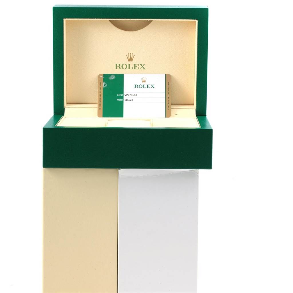 The image shows a Rolex Daytona 116523 Men's Steel and Gold (two tone) White Dial 116523 Men's Steel and Gold (two tone) White Dial watch box and guarantee card from a frontal angle.