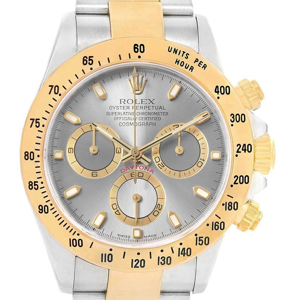 The image shows a front view of a Rolex Daytona 116523 Men's Steel and Gold (two tone) Grey Dial 116523 Men's Steel and Gold (two tone) Grey Dial watch, highlighting its dial, bezel, and chronograph subdials.