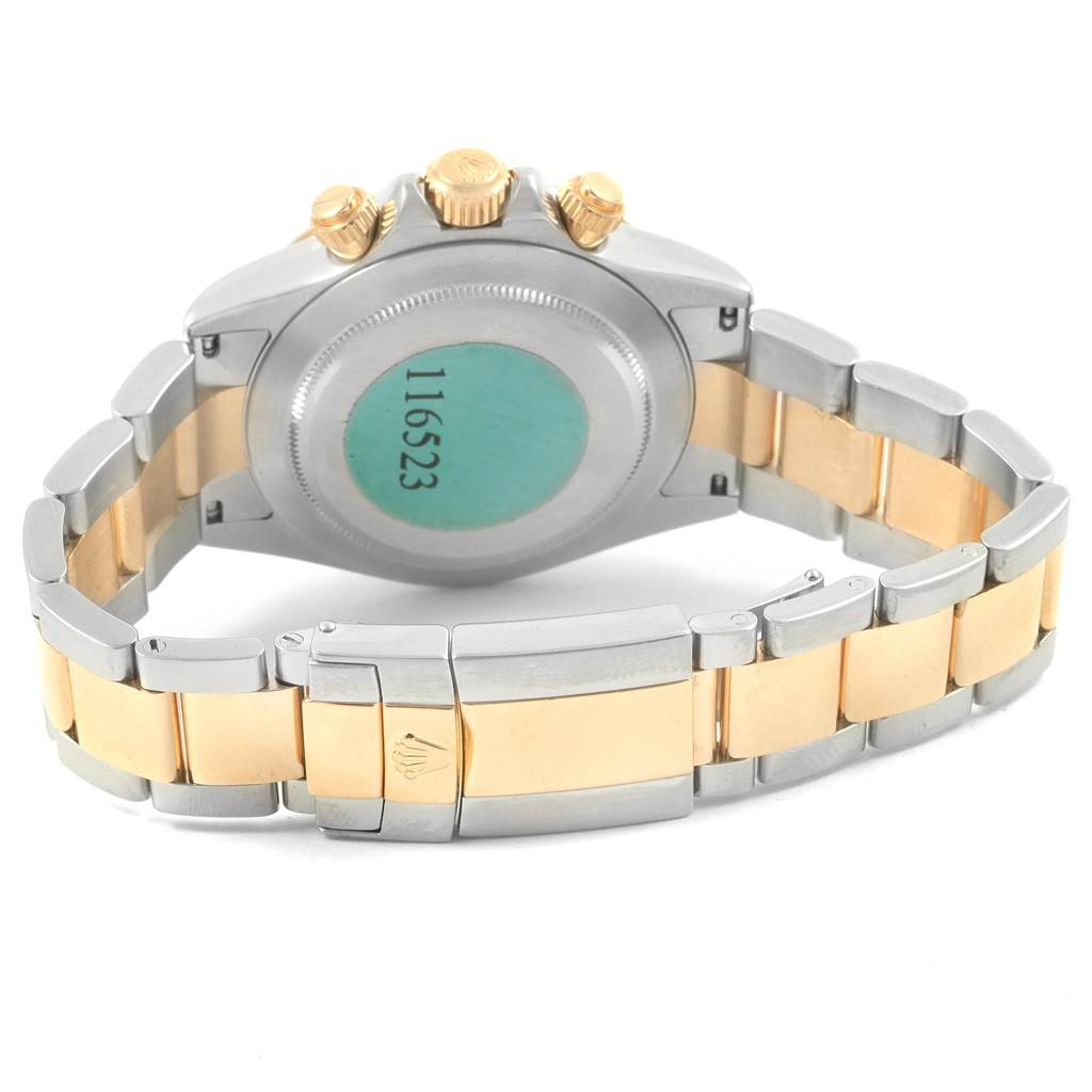 The image shows the back case, bracelet, and clasp of a Rolex Daytona 116523 Men's Steel and Gold (two tone) Grey Dial 116523 Men's Steel and Gold (two tone) Grey Dial watch.