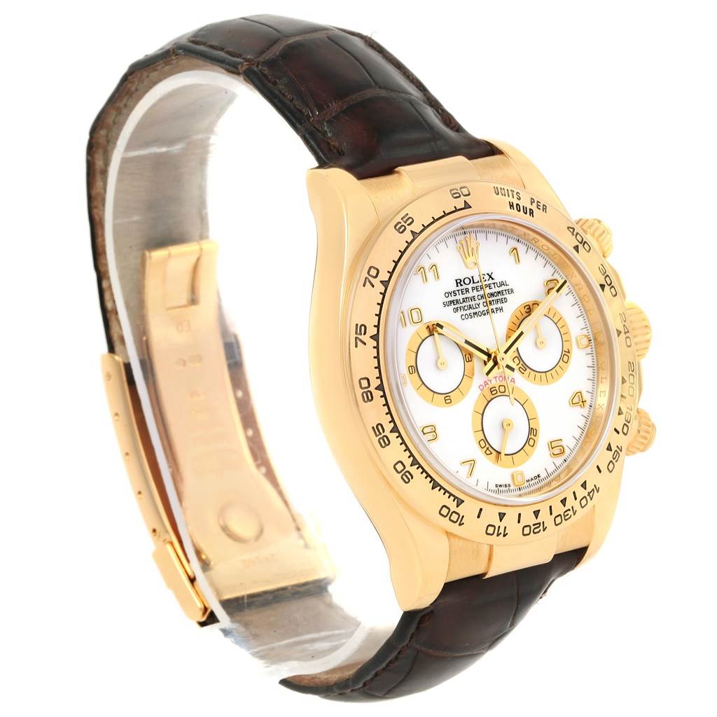 The Rolex Daytona 116518 Men's Yellow Gold White Dial 116518 Men's Yellow Gold White Dial watch is shown at a front-oblique angle, displaying the dial, bezel, crown, pushers, and leather strap.