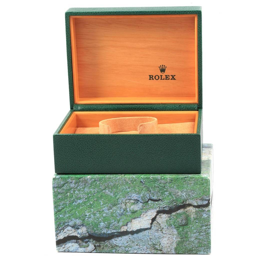 This image shows an open box for a Rolex Daytona 116520 Men's Stainless Steel White Dial 116520 Men's Stainless Steel White Dial watch at a straight-on angle.