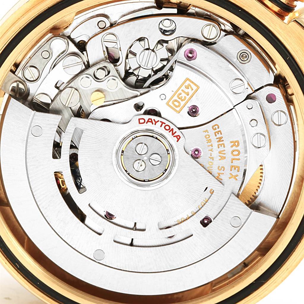 This image shows the intricate internal mechanism of a Rolex Daytona 116528 Men's Yellow Gold Champagne Dial 116528 Men's Yellow Gold Champagne Dial watch, captured from the back.