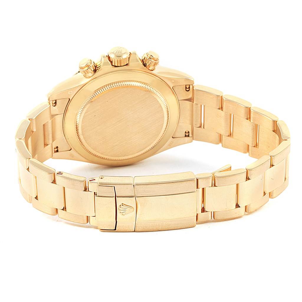 This image shows the back view of a gold Rolex Daytona 116528 Men's Yellow Gold Champagne Dial 116528 Men's Yellow Gold Champagne Dial watch, highlighting the bracelet and clasp.