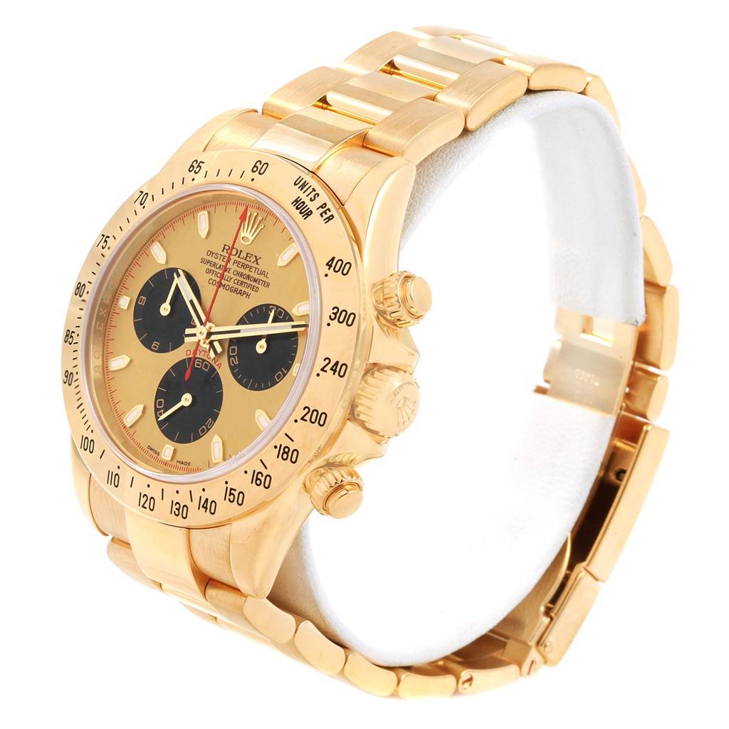 The image shows a Rolex Daytona 116528 Men's Yellow Gold Champagne Dial 116528 Men's Yellow Gold Champagne Dial gold watch at a three-quarter side angle, highlighting the bezel, dial, pushers, and bracelet.