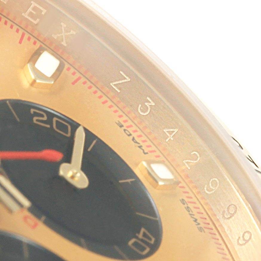 This close-up of a Rolex Daytona 116528 Men's Yellow Gold Champagne Dial 116528 Men's Yellow Gold Champagne Dial watch shows the side of the dial, focusing on partial sub-dials and hour markers.