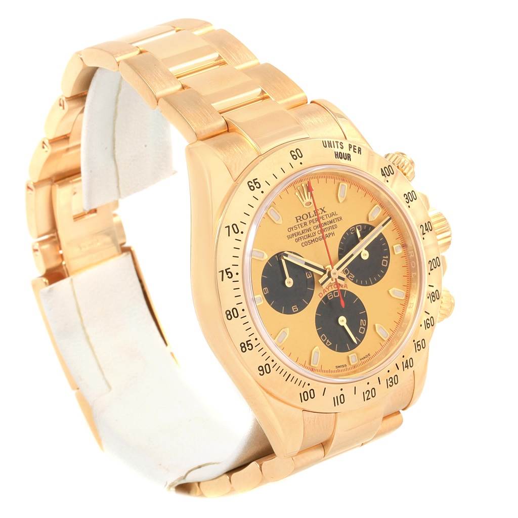 The image shows a Rolex Daytona 116528 Men's Yellow Gold Champagne Dial 116528 Men's Yellow Gold Champagne Dial watch at a three-quarter angle, highlighting the case, bracelet, and dial.