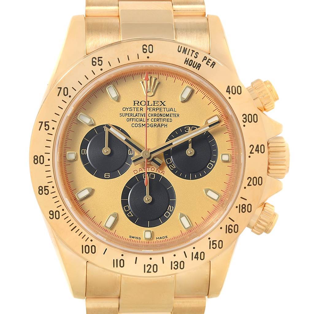 This image shows a front view of a Rolex Daytona 116528 Men's Yellow Gold Champagne Dial 116528 Men's Yellow Gold Champagne Dial watch, highlighting its gold case, black subdials, and bezel with tachymetric scale.