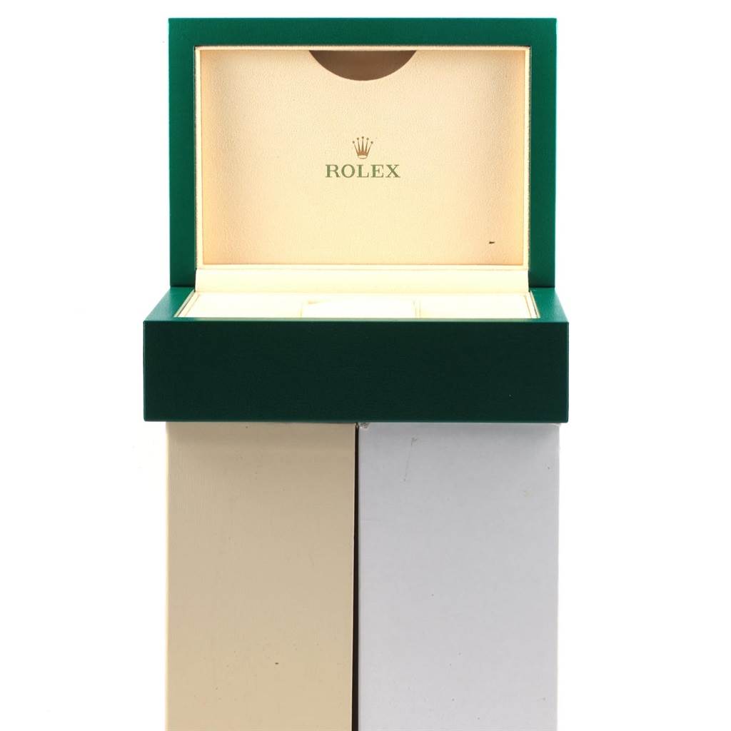 This image shows the open box of a Rolex Daytona 116509 Men's White Gold Silver Dial 116509 Men's White Gold Silver Dial watch, displaying the inner lining and logo.