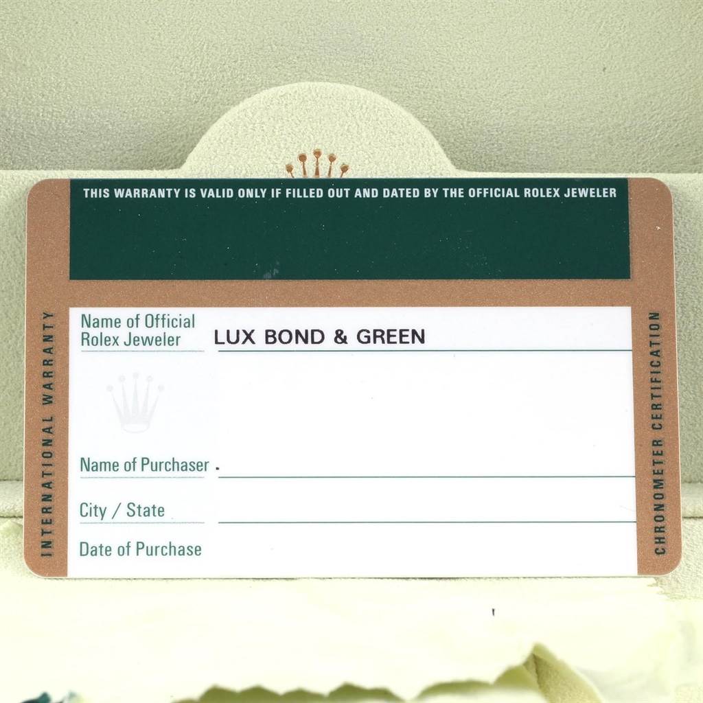 The image shows the warranty card for the Rolex Daytona 116520 Men's Stainless Steel Black Dial 116520 Men's Stainless Steel Black Dial model, displaying its official jeweler information.