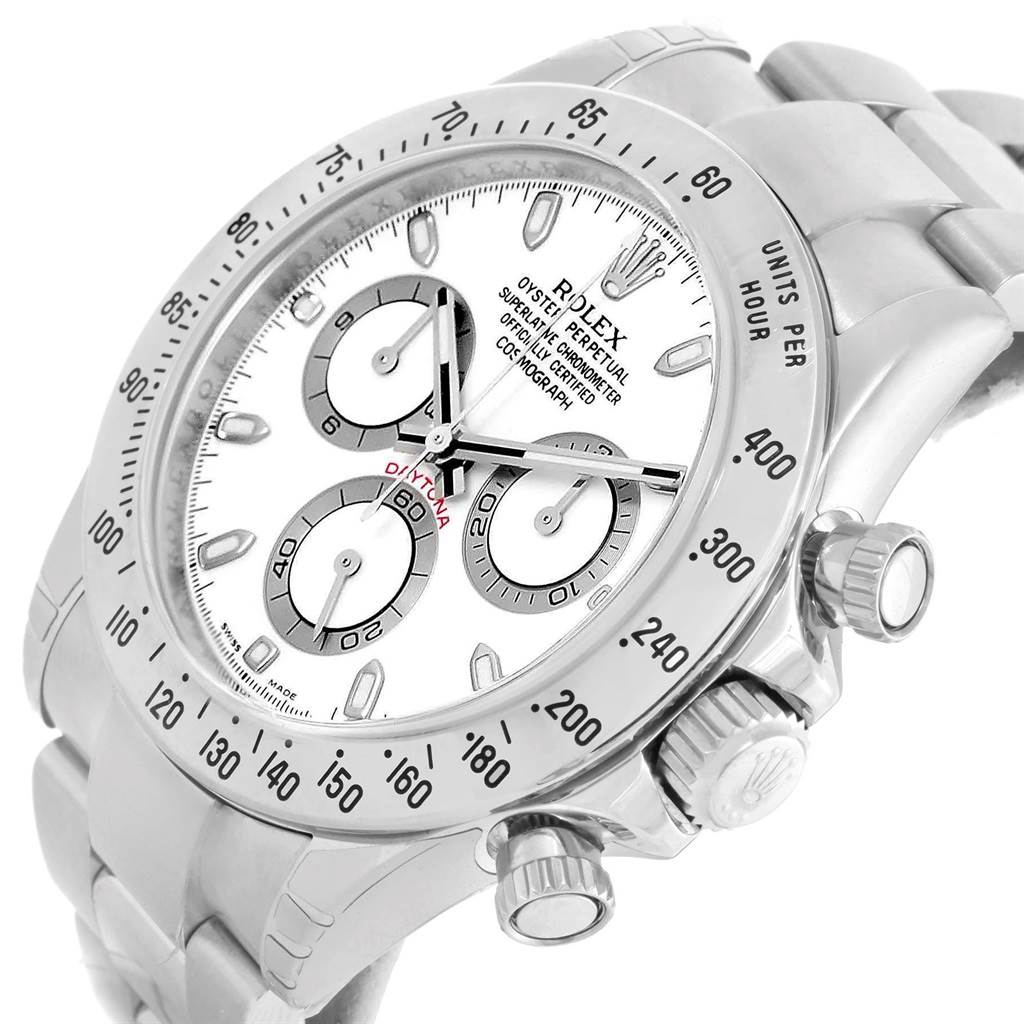 The image shows a Rolex Daytona 116520 Men's Stainless Steel White Dial 116520 Men's Stainless Steel White Dial watch at an angle, highlighting the face, bezel, and chronograph pushers.