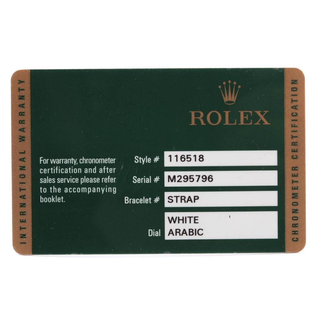 This image shows the international warranty card for a Rolex Daytona 116518 Men's Yellow Gold Black Dial 116518 Men's Yellow Gold Black Dial watch, displaying model, serial, and dial information.