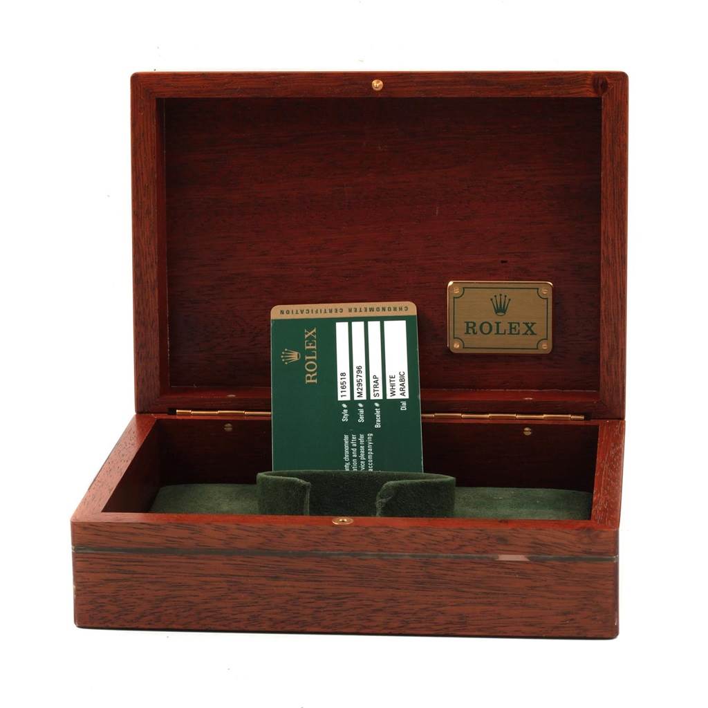 The image shows an open wooden Rolex box with a certification card, likely for a Rolex Daytona 116518 Men's Yellow Gold Black Dial 116518 Men's Yellow Gold Black Dial model.