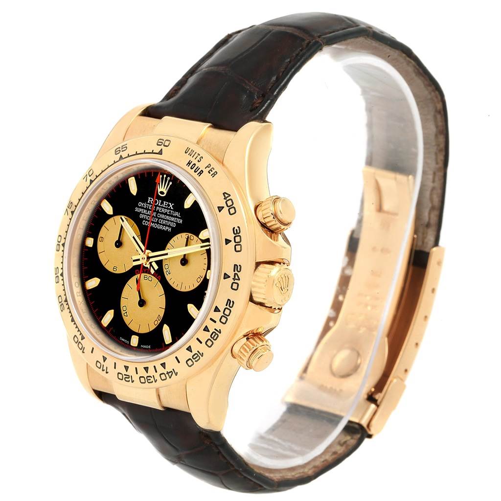 This side angle shows a Rolex Daytona 116518 Men's Yellow Gold Black Dial 116518 Men's Yellow Gold Black Dial watch featuring a gold case, black dial, three subdials, and a leather strap.