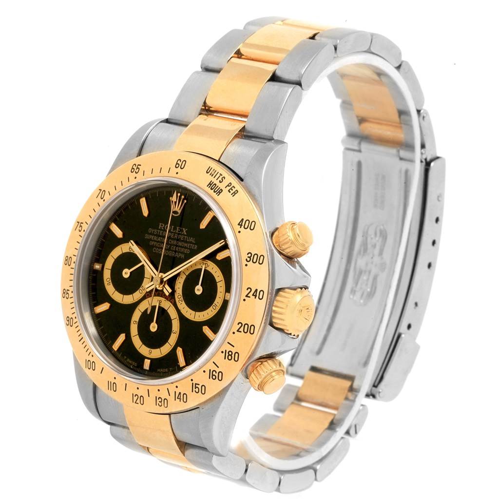 This image shows a side and front view of the Rolex Daytona 16523 Men's Steel and Gold (two tone) Black Dial 16523 Men's Steel and Gold (two tone) Black Dial watch, highlighting the dial, bezel, crown, and bracelet.