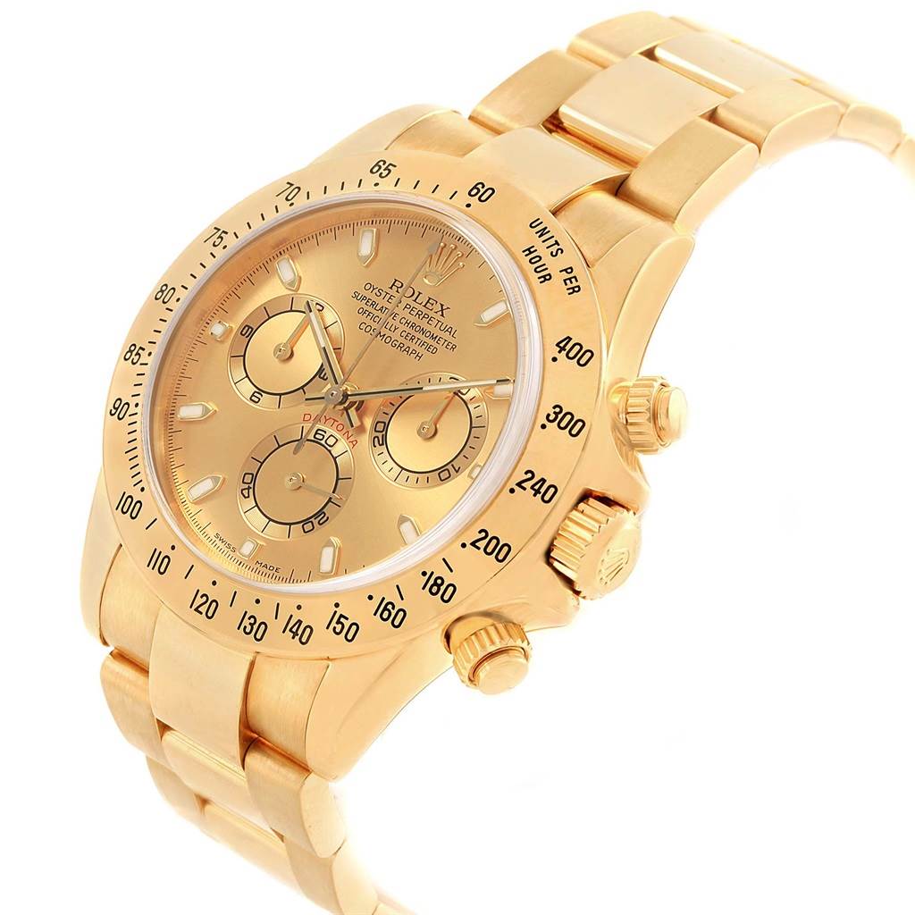 The Rolex Daytona 116528 Men's Yellow Gold Champagne Dial 116528 Men's Yellow Gold Champagne Dial watch is shown from a slight side angle, displaying the face, bezel, pushers, and bracelet.
