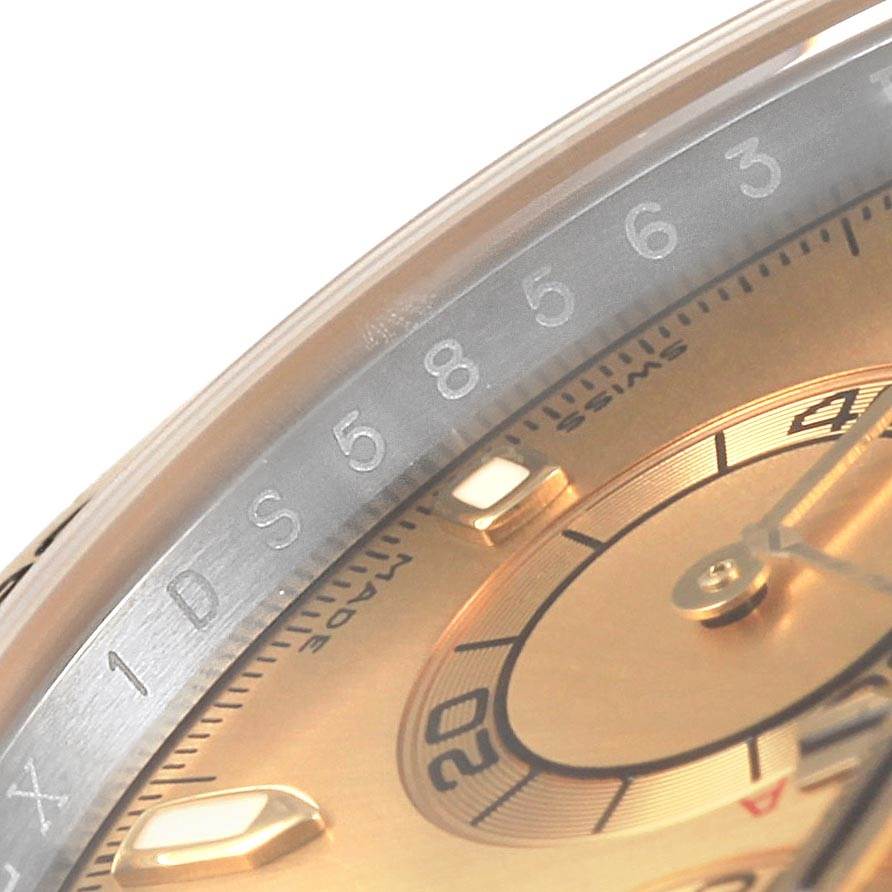 This close-up shows the dial and part of the bezel of the Rolex Daytona 116503 Men's Steel and Gold (two tone) Champagne Dial 116503 Men's Steel and Gold (two tone) Champagne Dial watch, highlighting the numerals and markings.