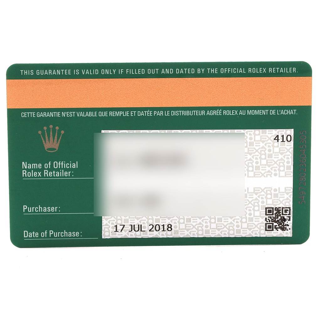 This image shows a green and orange official Rolex warranty card for the Daytona model, with purchase details.