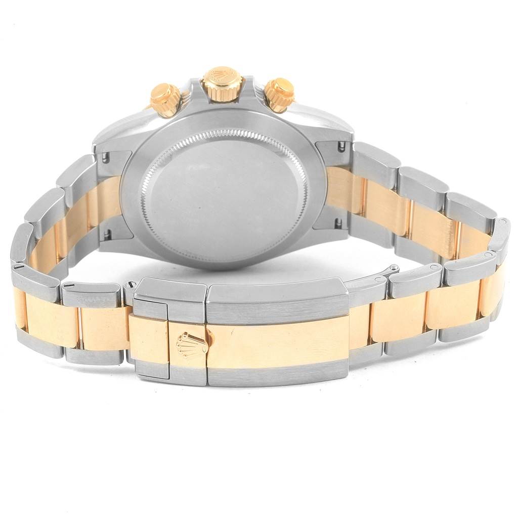 This image shows the back case and bracelet clasp of a Rolex Daytona 116503 Men's Steel and Gold (two tone) Champagne Dial 116503 Men's Steel and Gold (two tone) Champagne Dial watch.