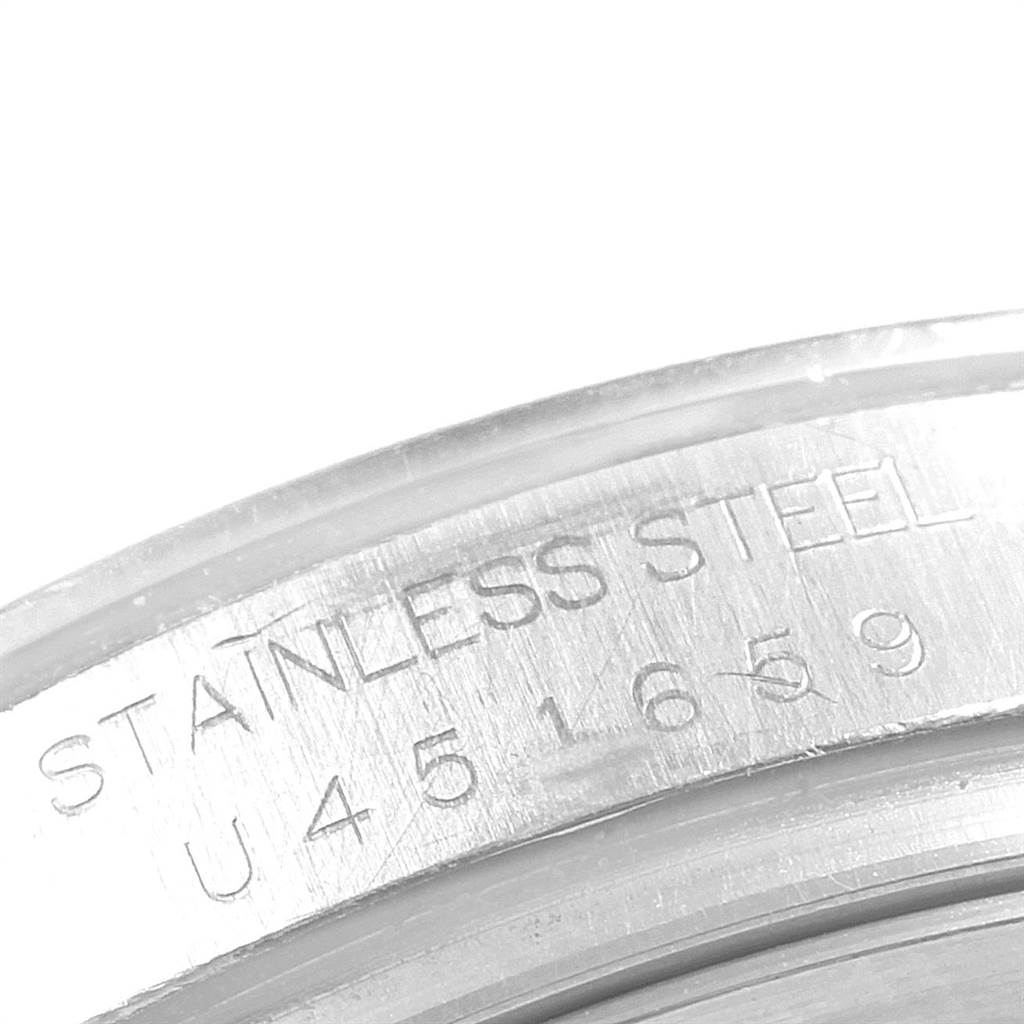 This image shows a close-up of the stainless steel case back engraving on a Rolex Daytona 16520 Men's Stainless Steel Black Dial 16520 Men's Stainless Steel Black Dial watch.