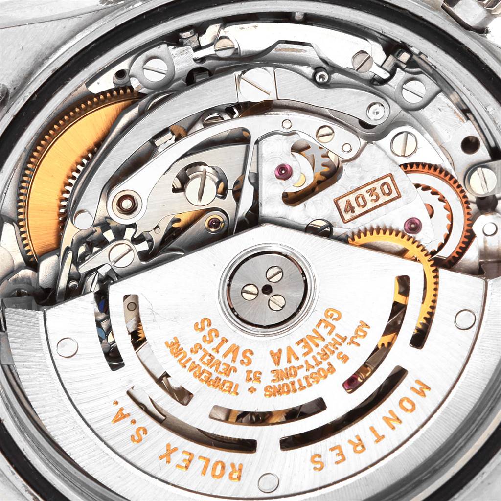 This image shows the intricate internal movement mechanism of the Rolex Daytona 16520 Men's Stainless Steel Black Dial 16520 Men's Stainless Steel Black Dial watch.