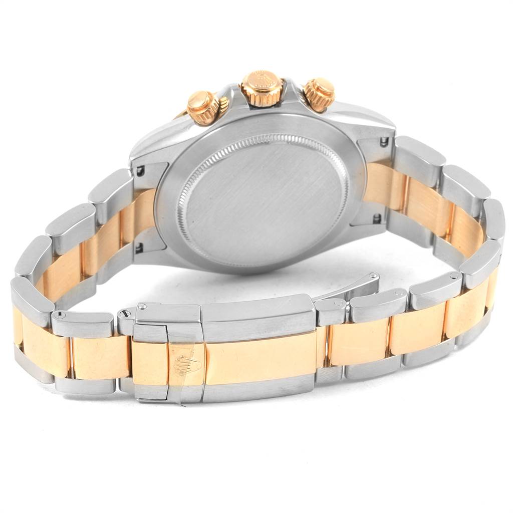 The image shows the back case and bracelet of the Rolex Daytona 116523 Men's Steel and Gold (two tone) Grey Dial 116523 Men's Steel and Gold (two tone) Grey Dial watch, highlighting the two-tone metal design and clasp.