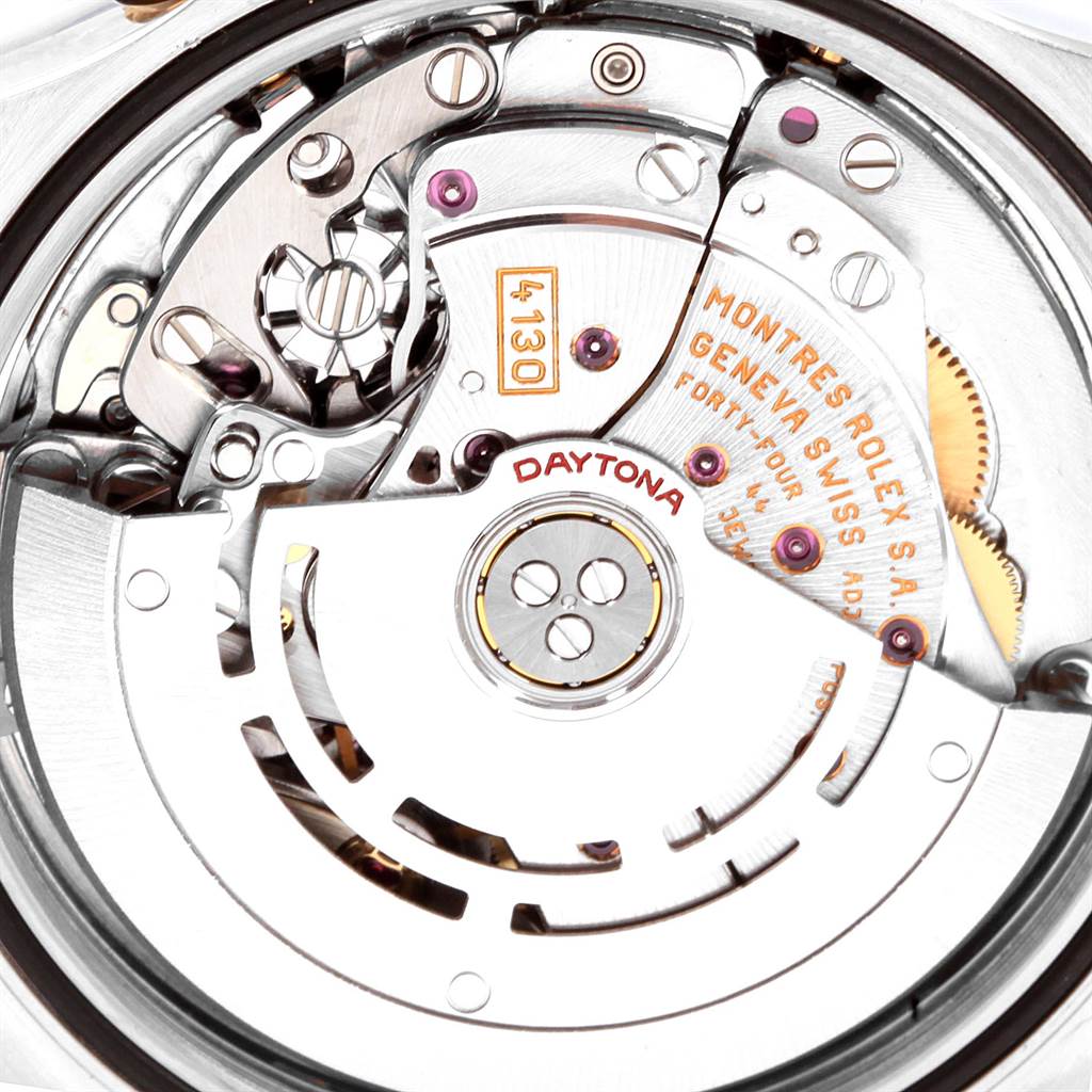 This image shows a close-up of the movement mechanism inside a Rolex Daytona 116523 Men's Steel and Gold (two tone) Grey Dial 116523 Men's Steel and Gold (two tone) Grey Dial watch.