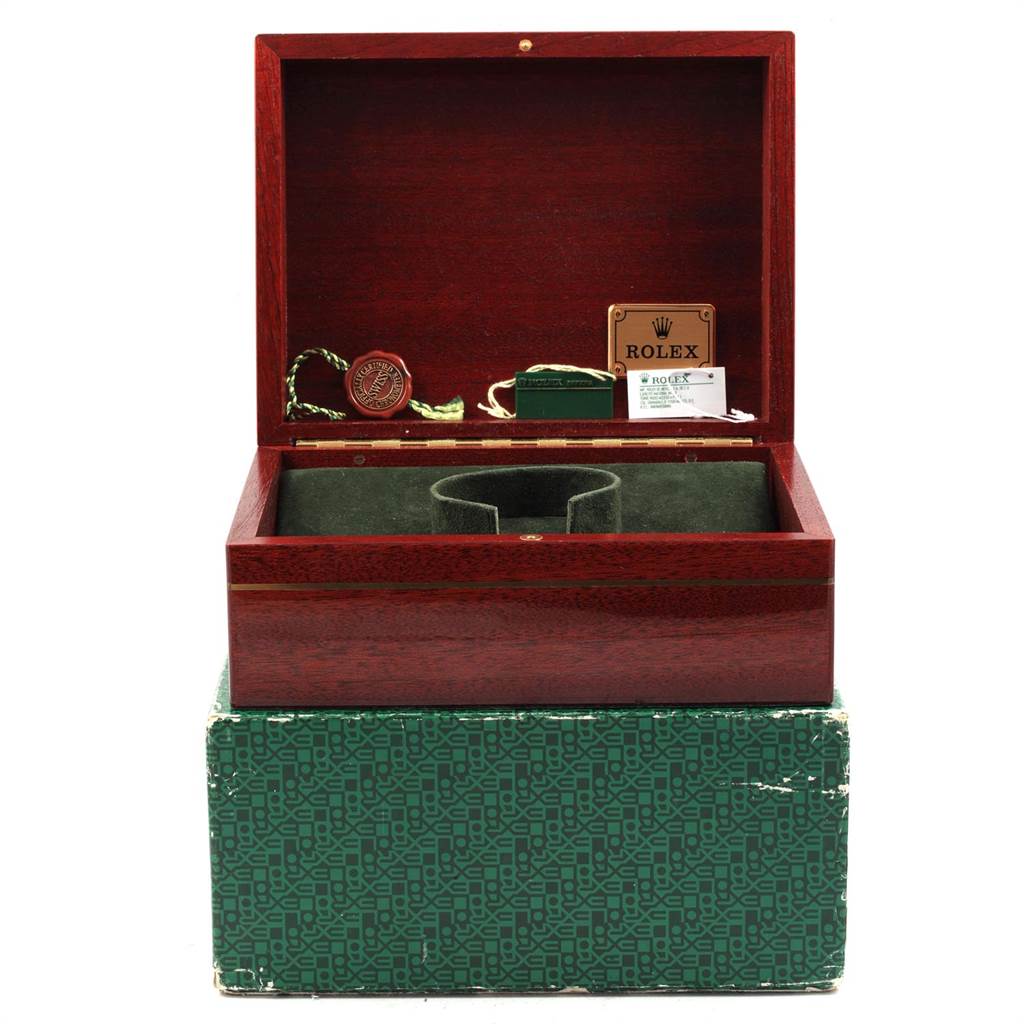 The image shows a Rolex Daytona 116523 Men's Steel and Gold (two tone) Black Dial 116523 Men's Steel and Gold (two tone) Black Dial watch box and accessories including tags and papers from a front angle.