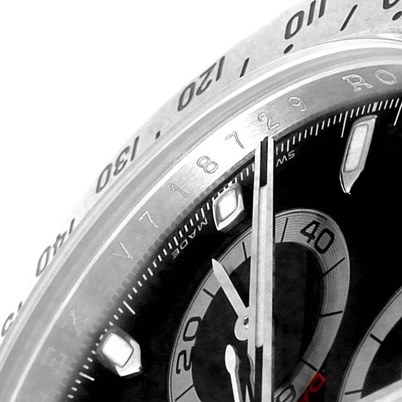 The image shows a close-up of the dial, subdials, and bezel of a Rolex Daytona 116520 Men's Stainless Steel Black Dial 116520 Men's Stainless Steel Black Dial watch, highlighting the tachymeter scale.
