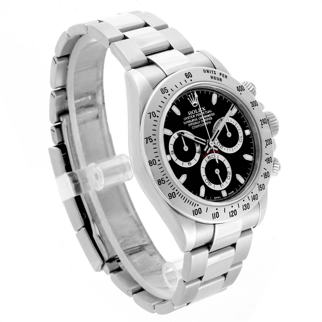 The image shows a Rolex Daytona 116520 Men
s Stainless Steel Black Dial 116520 Men
s Stainless Steel Black Dial watch at an angled side view, highlighting its dial, bezel, and stainless steel bracelet.