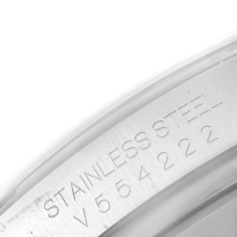 The image shows a close-up of the engraving on the stainless steel inner bezel of a Rolex Daytona 116520 Men
s Stainless Steel Black Dial 116520 Men
s Stainless Steel Black Dial watch.