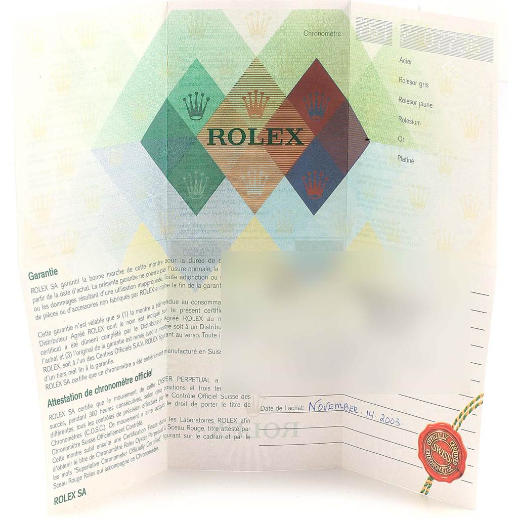 This image shows the warranty and certification papers for a Rolex Daytona 116520 Men's Stainless Steel Black Dial 116520 Men's Stainless Steel Black Dial watch.