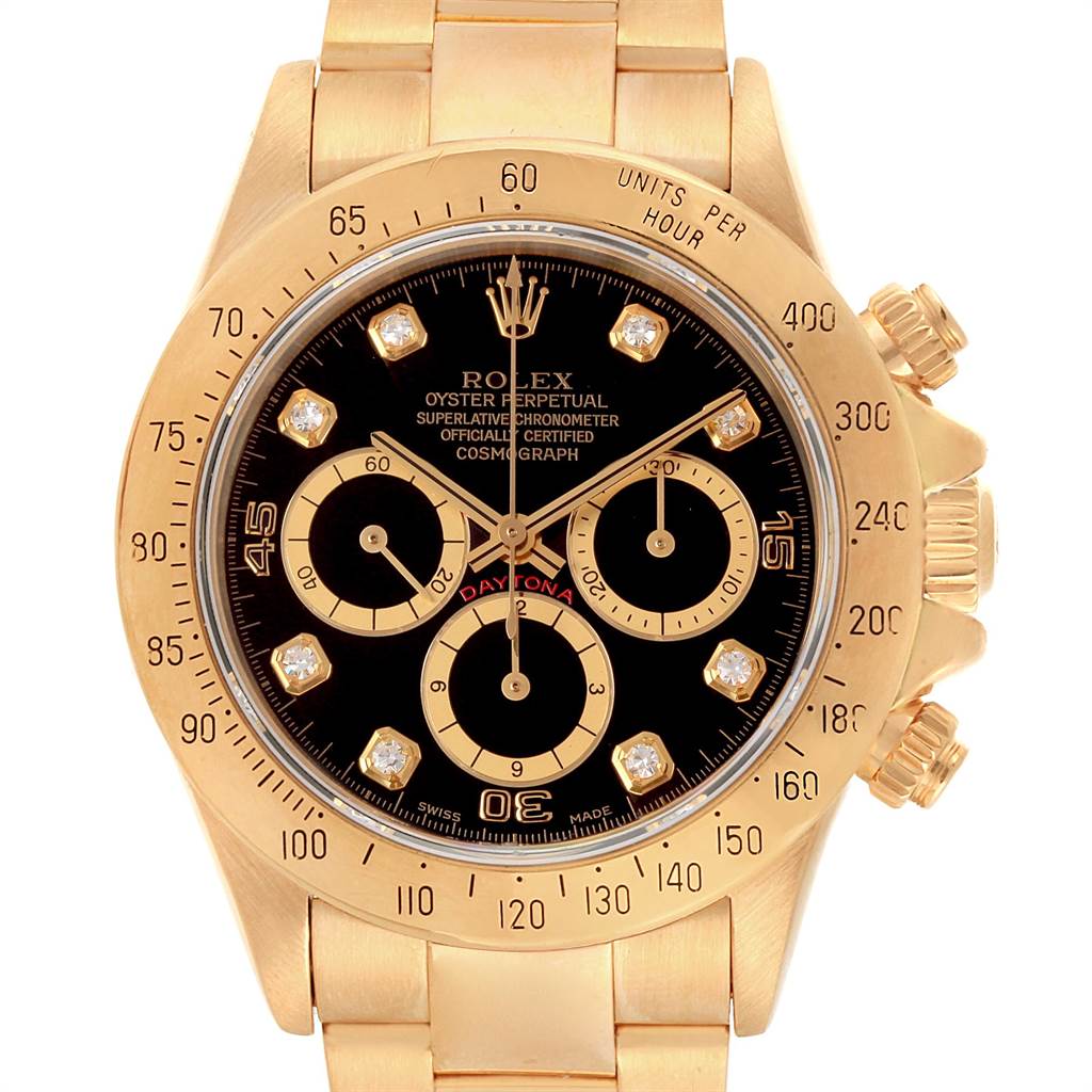 This image shows a Rolex Daytona 16528 Men's Yellow Gold Black Dial 16528 Men's Yellow Gold Black Dial watch front-on, featuring its dial, bezel, and bracelet.