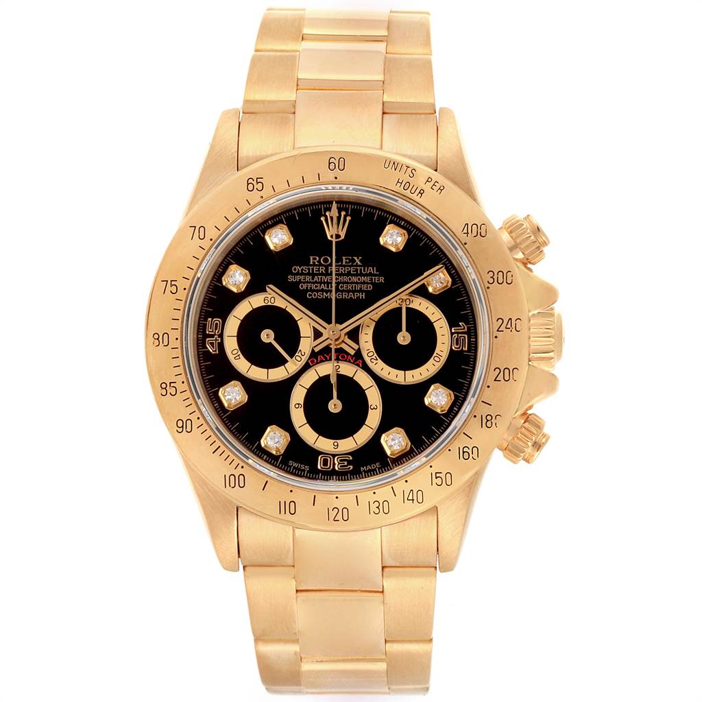The image shows the front view of a Rolex Daytona 16528 Men's Yellow Gold Black Dial 16528 Men's Yellow Gold Black Dial watch, highlighting its black dial, subdials, and gold case and bracelet.