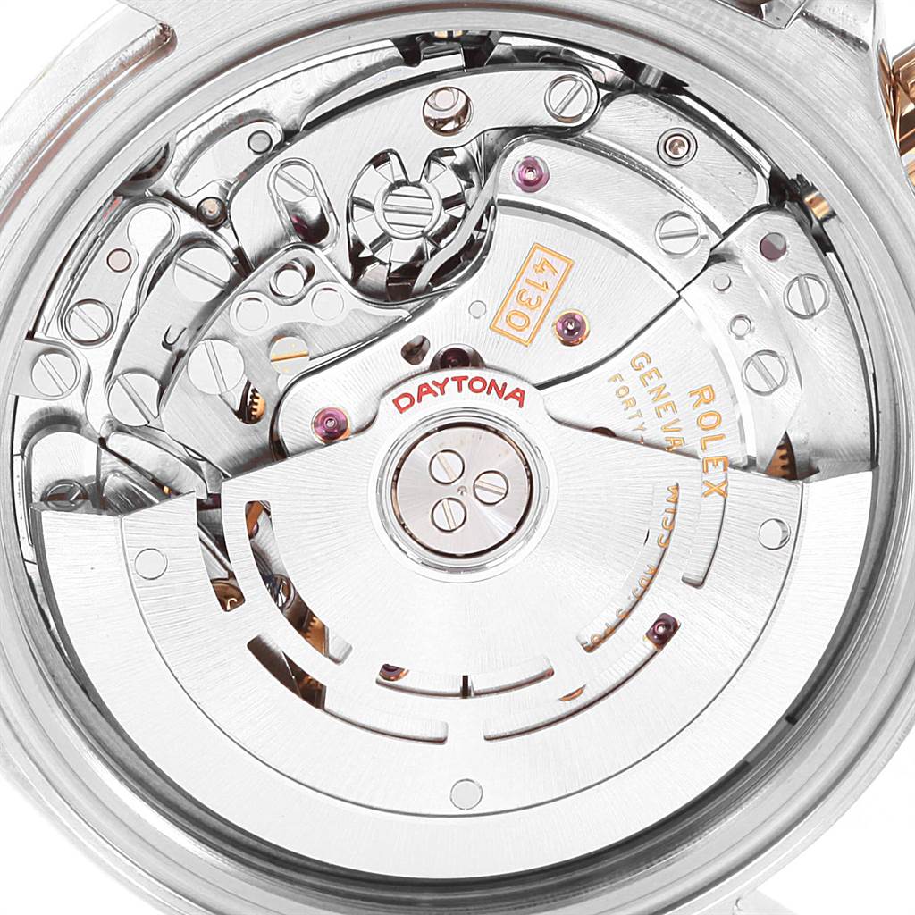 This image shows the intricate internal movement of the Rolex Daytona 116523 Men's Steel and Gold (two tone) Grey Dial 116523 Men's Steel and Gold (two tone) Grey Dial watch.