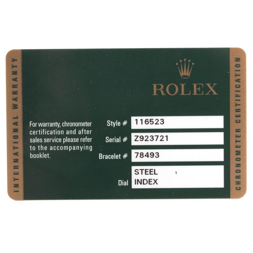 This image shows the international warranty card for a Rolex Daytona 116523 Men's Steel and Gold (two tone) Grey Dial 116523 Men's Steel and Gold (two tone) Grey Dial model, including style, serial, bracelet numbers, and dial details.