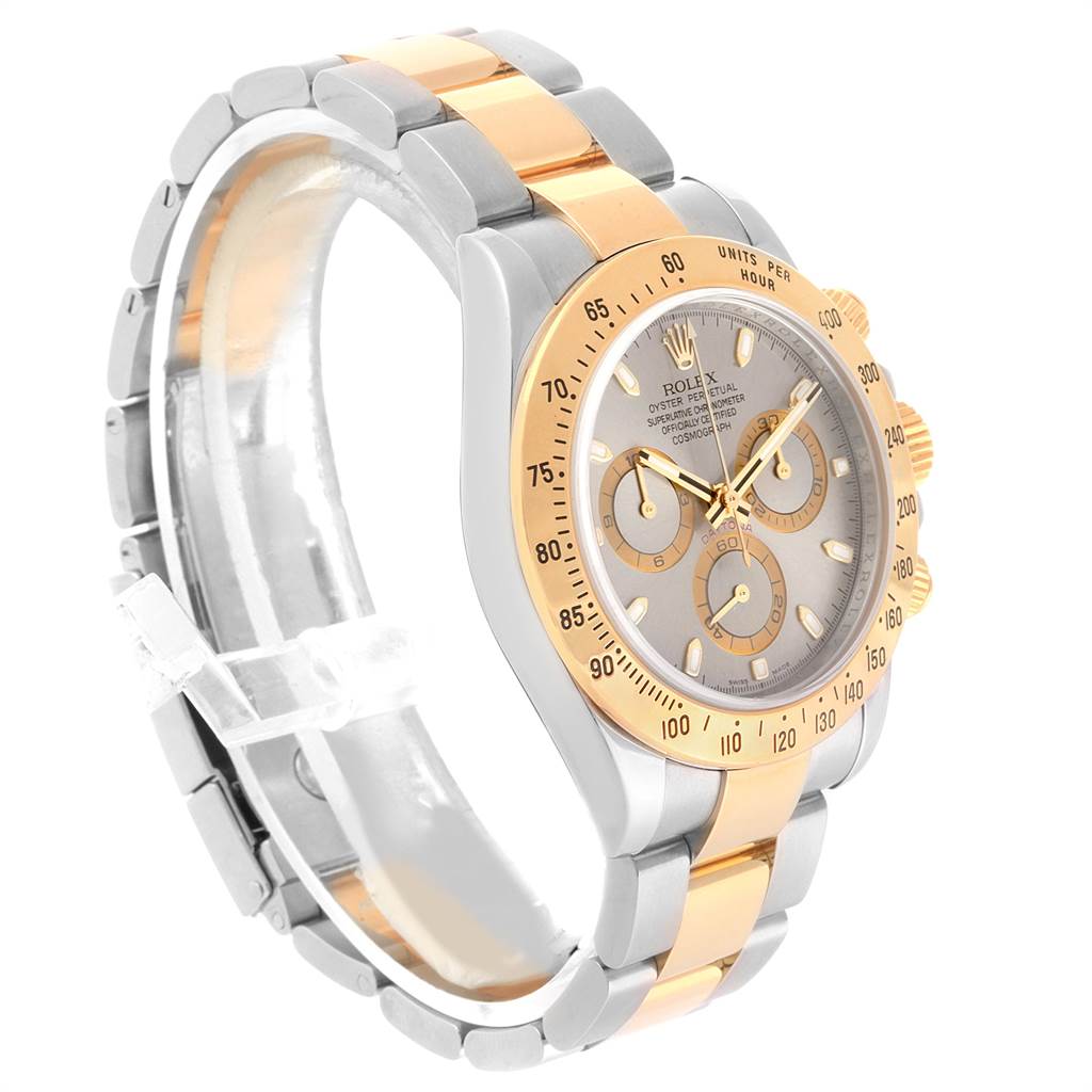 This Rolex Daytona 116523 Men's Steel and Gold (two tone) Grey Dial 116523 Men's Steel and Gold (two tone) Grey Dial watch is shown at a three-quarter angle, displaying its face, crown, pushers, and two-tone bracelet.
