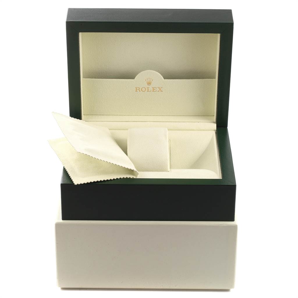 This is an open Rolex box for the Daytona model, showing the interior, a cloth, and a cushion.