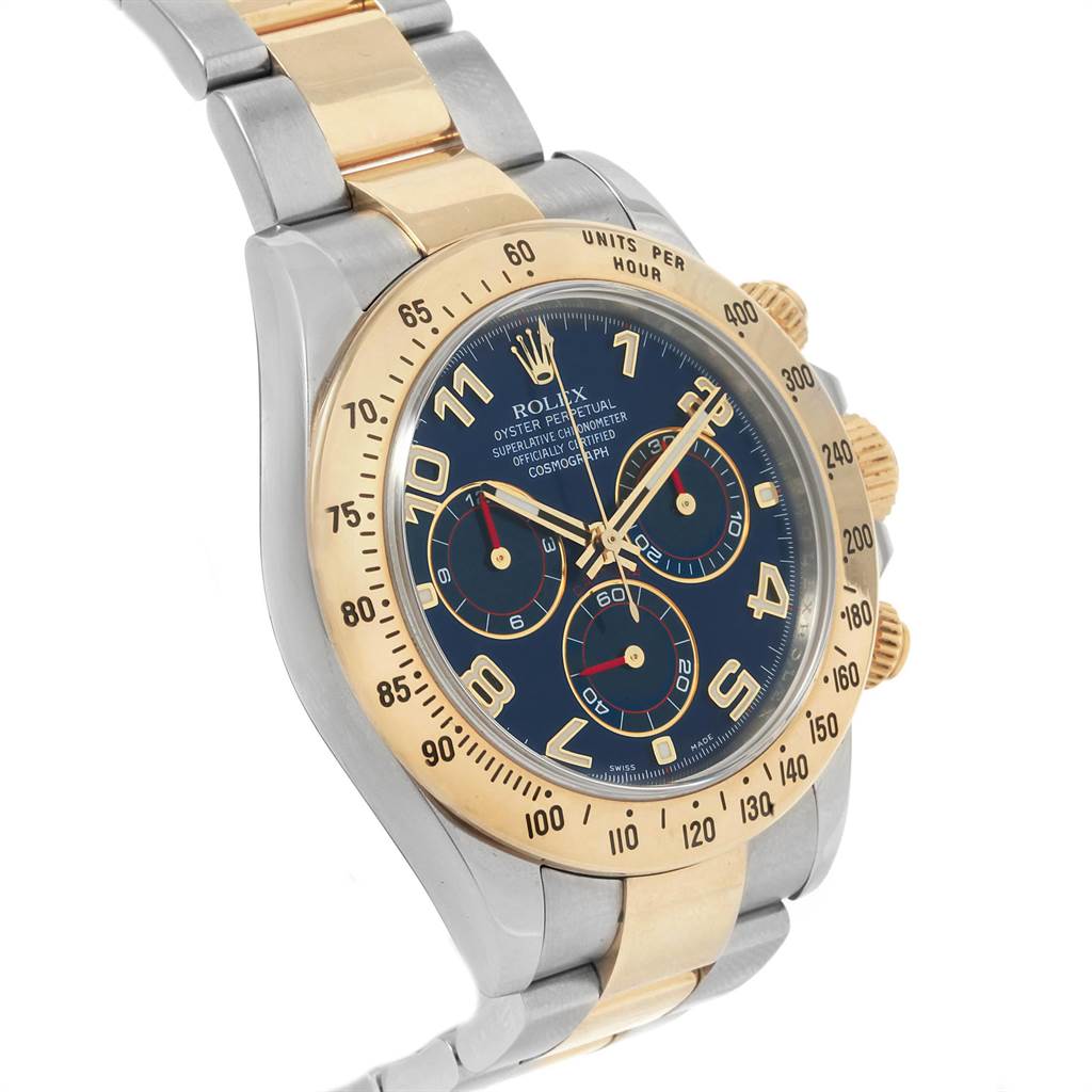 The Rolex Daytona 116523 Men's Steel and Gold (two tone) Blue Dial 116523 Men's Steel and Gold (two tone) Blue Dial watch is shown at an angle highlighting the face, bezel, chronograph dials, and part of the two-tone bracelet.