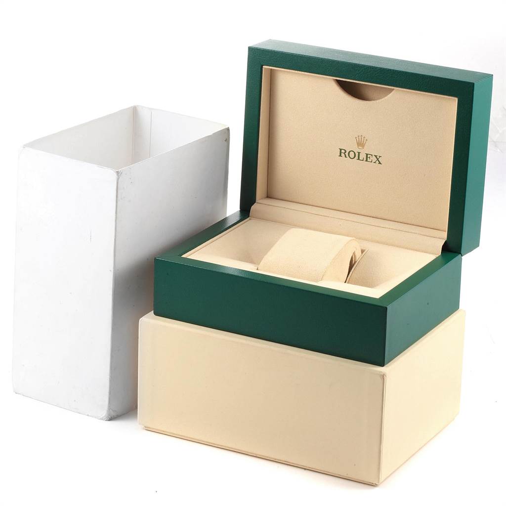 The image shows the packaging for a Rolex Daytona 116523 Men's Steel and Gold (two tone) Blue Dial 116523 Men's Steel and Gold (two tone) Blue Dial watch, including the green Rolex box, inner cushion, and outer protective box.