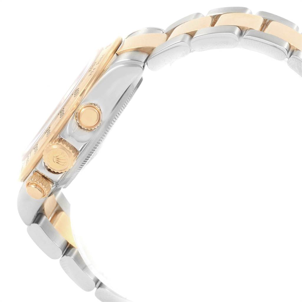 This image shows a side view of the Rolex Daytona 116523 Men's Steel and Gold (two tone) White Dial 116523 Men's Steel and Gold (two tone) White Dial watch, highlighting its crown, pushers, and two-tone bracelet.