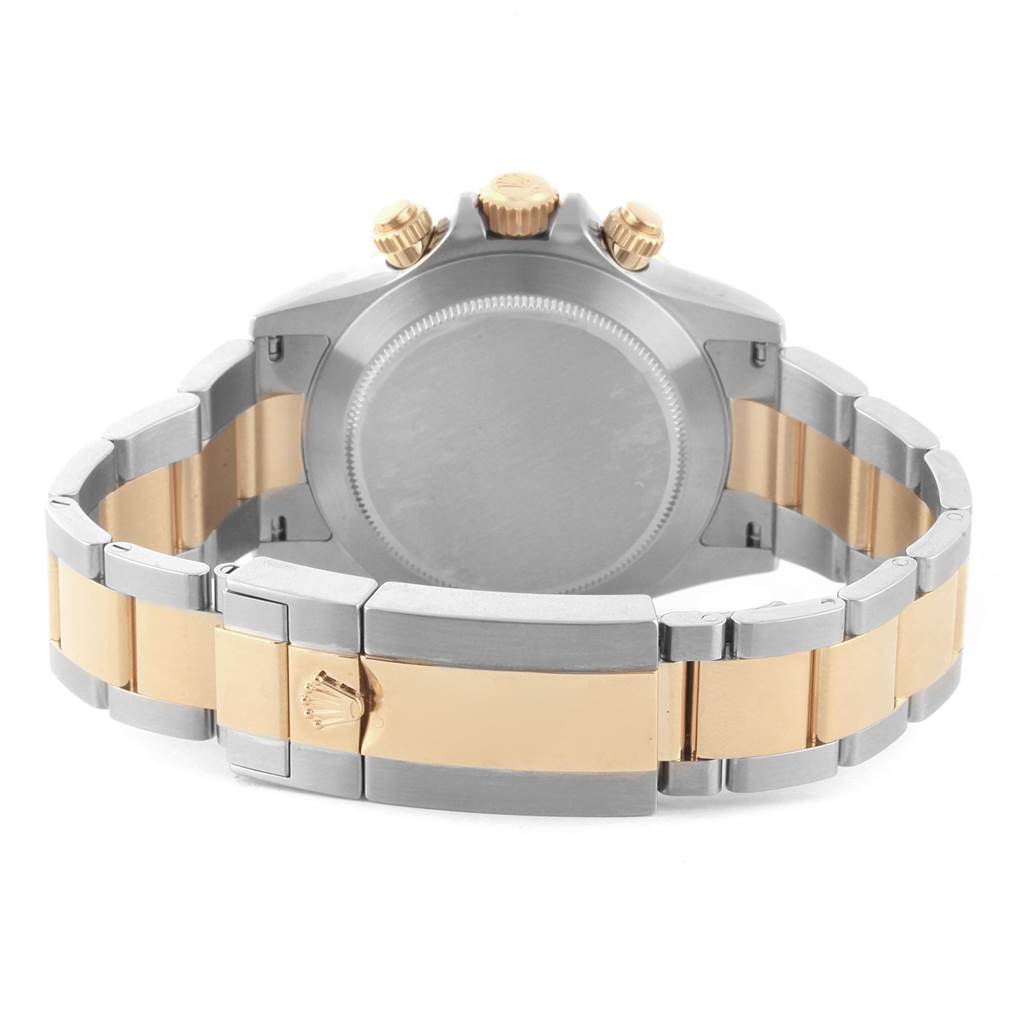 The image shows the back case and bracelet clasp of a Rolex Daytona 116523 Men's Steel and Gold (two tone) White Dial 116523 Men's Steel and Gold (two tone) White Dial, viewed from the rear.